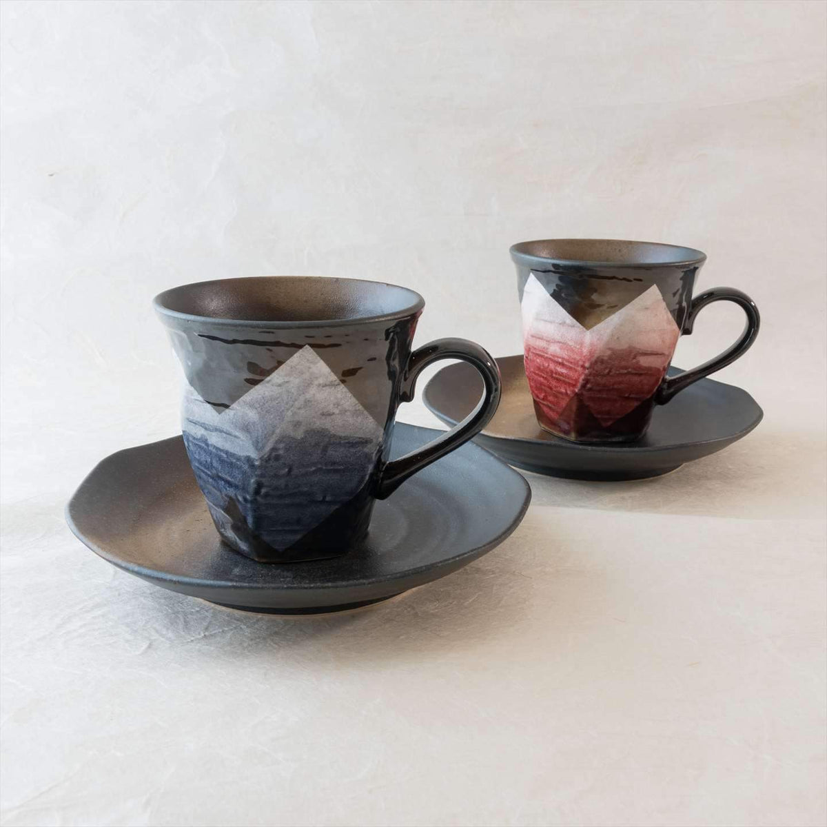 http://kutaniware.com/cdn/shop/products/ginsai-purple-and-pink-kutani-cup-and-saucer-pair-musubi-kiln-handmade-japanese-tableware-and-japanese-dinnerware-988352_1200x1200.jpg?v=1685579038