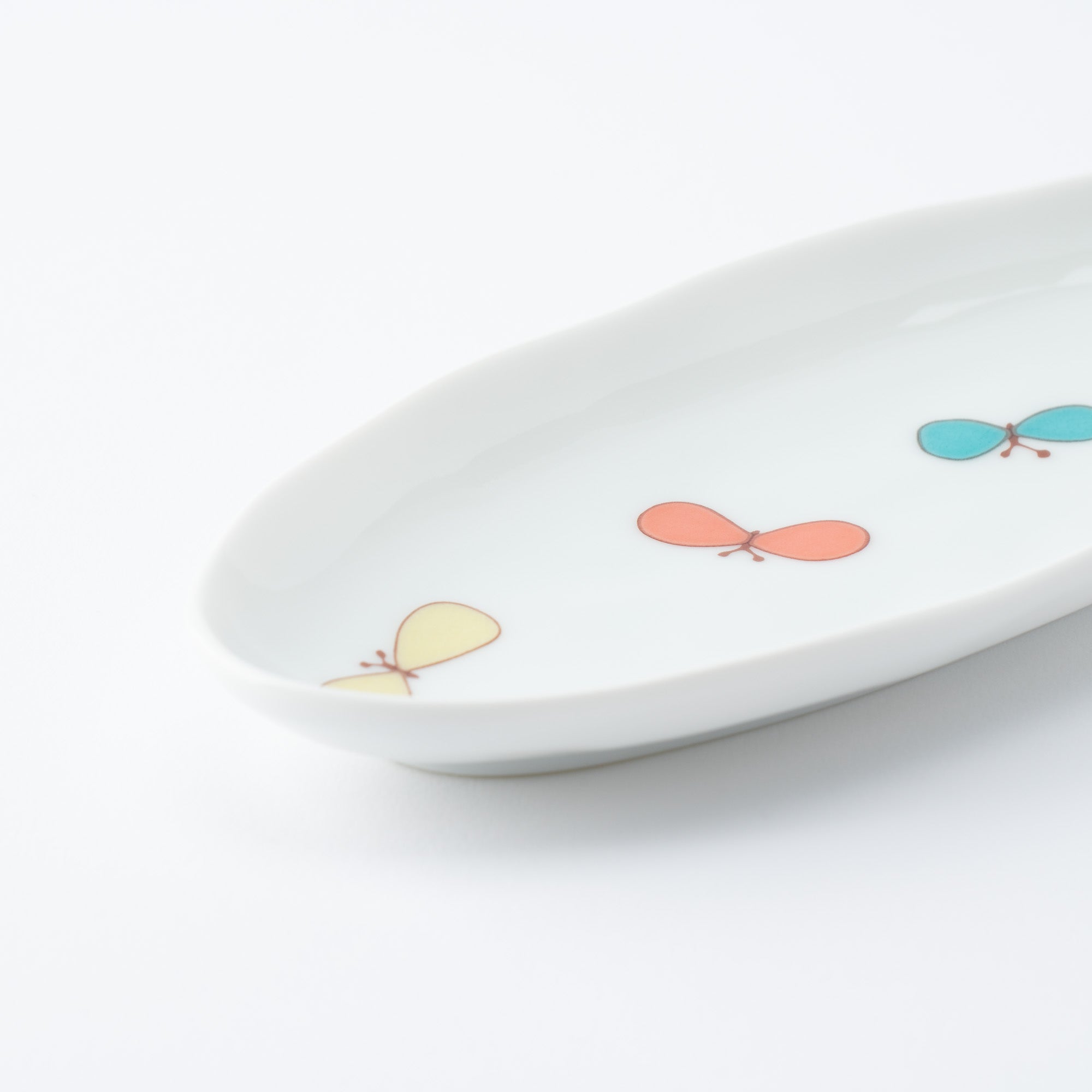 Playful Pattern Oval Side Plate