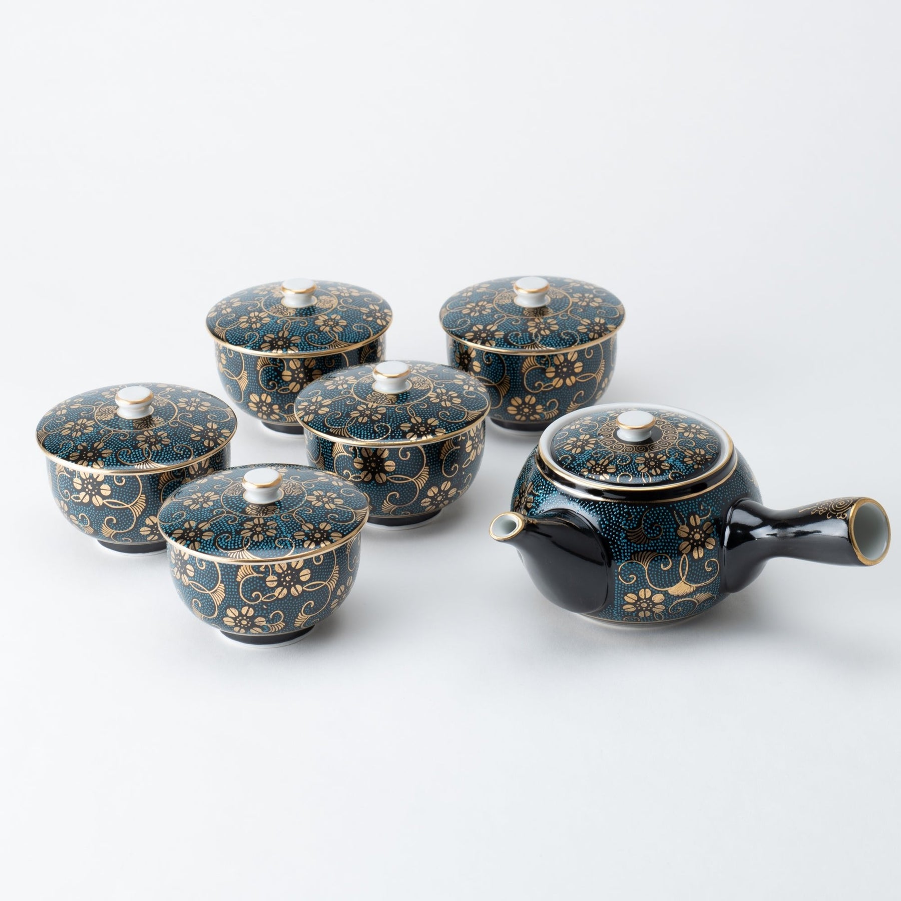 https://kutaniware.com/cdn/shop/products/aochibu-and-clematis-kutani-japanese-teapot-set-musubi-kiln-handmade-japanese-tableware-and-japanese-dinnerware-441971_1800x1800.jpg?v=1685579260